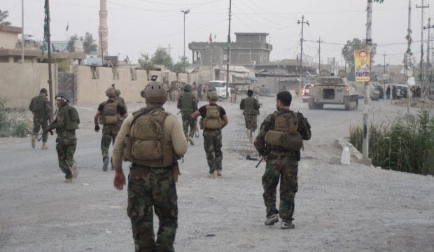 Iraq: Kurds build border defenses and plan for US military help