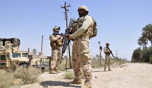 ISIS, Baghdad fight over strategic town southwest of capital