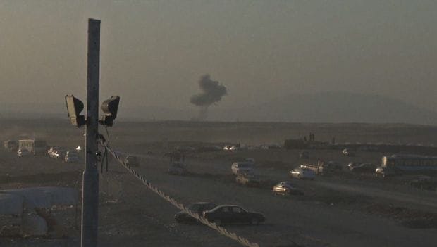 US aids displaced Iraqis as airstrikes help Kurds