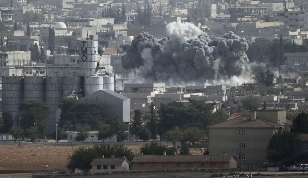 Fight for Syrian border town continues
