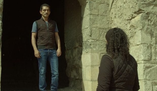 War reporter-turned movie maker turns camera on Egyptian slums