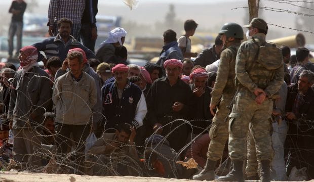 Turkey will try to stop ISIS taking Kurdish border town: PM