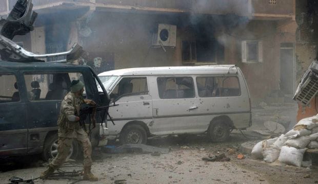 Heavy fighting near seaport of Libyan city Benghazi, navy ship hit