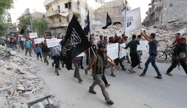 Leader of Syria Al-Qaeda wing threatens strikes against Hezbollah in Lebanon