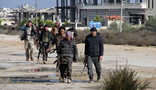 Around 180 Syrian soldiers, jihadists reported killed in battle for base