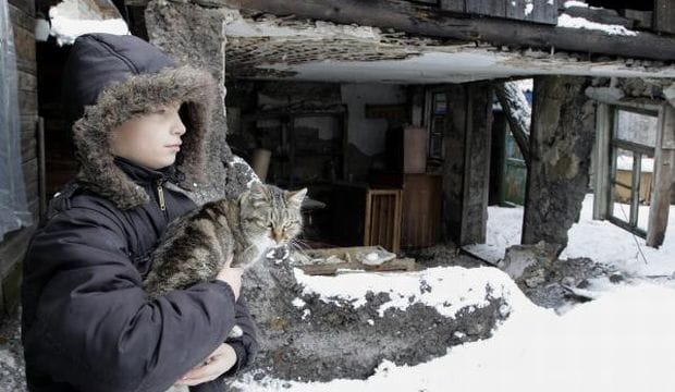 Shelling hits Ukraine bus, killing 10, as airport battle worsens