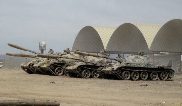 Saudis airdrop arms to Aden defenders, Houthis pull back