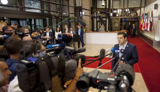 Euro zone strikes deal with Greece after all-night struggle