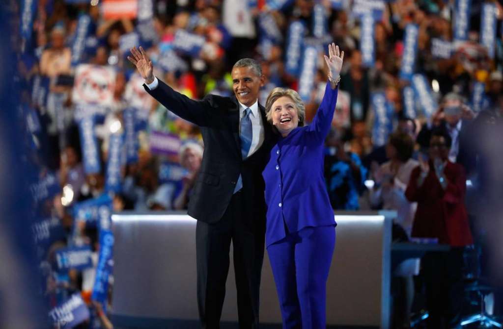 Obama Passes Torch to Clinton, Slams Trump