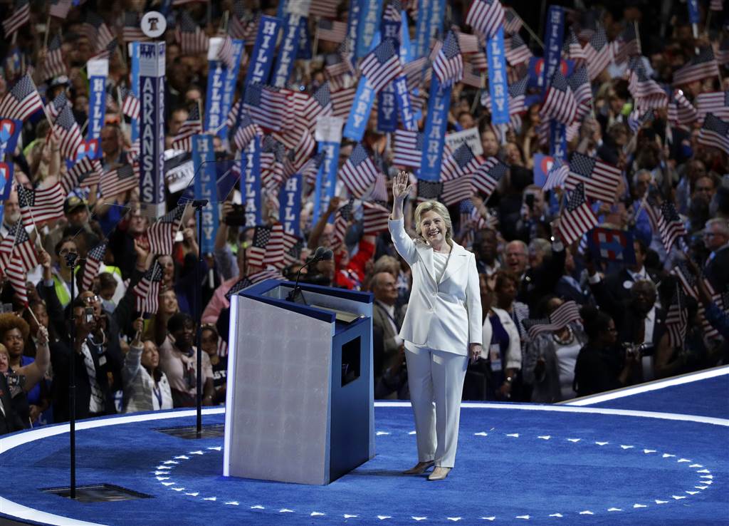Clinton Promotes National Unity, Takes Aim at Trump