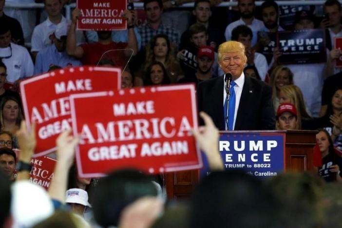 Trump Challenges Clinton’s Credentials amid Report he Used Charity Funds to Pay Legal Settlements
