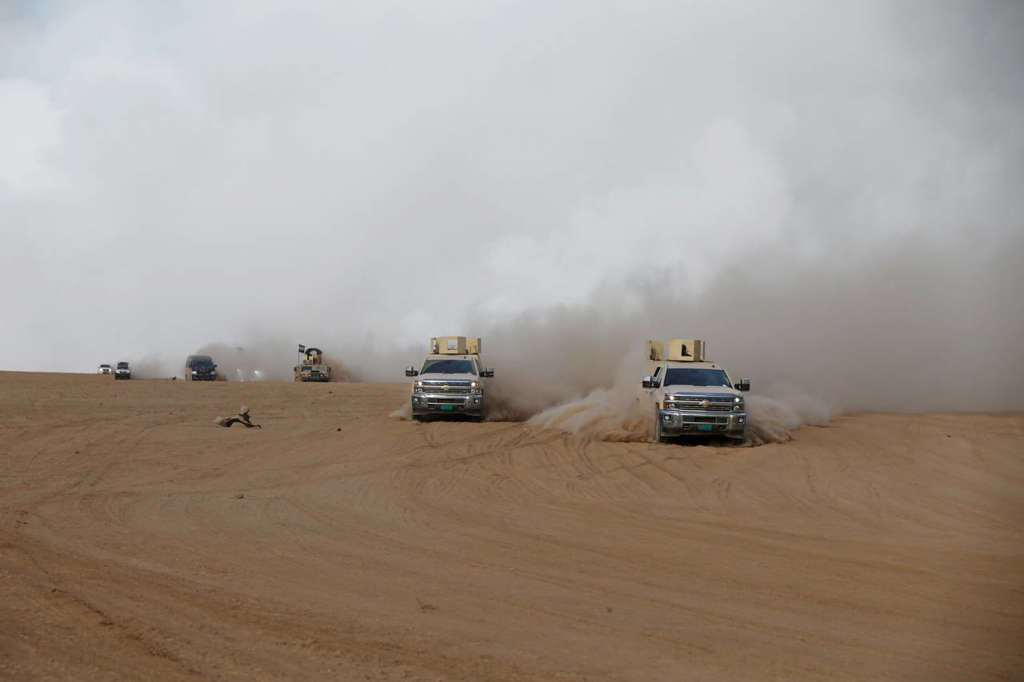 ISIS Burns Sulfur Stocks near Mosul, U.S. Troops Use Protective Masks