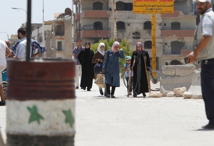 Phenomenon Spreads in Damascus: Citizens in Military Costumes