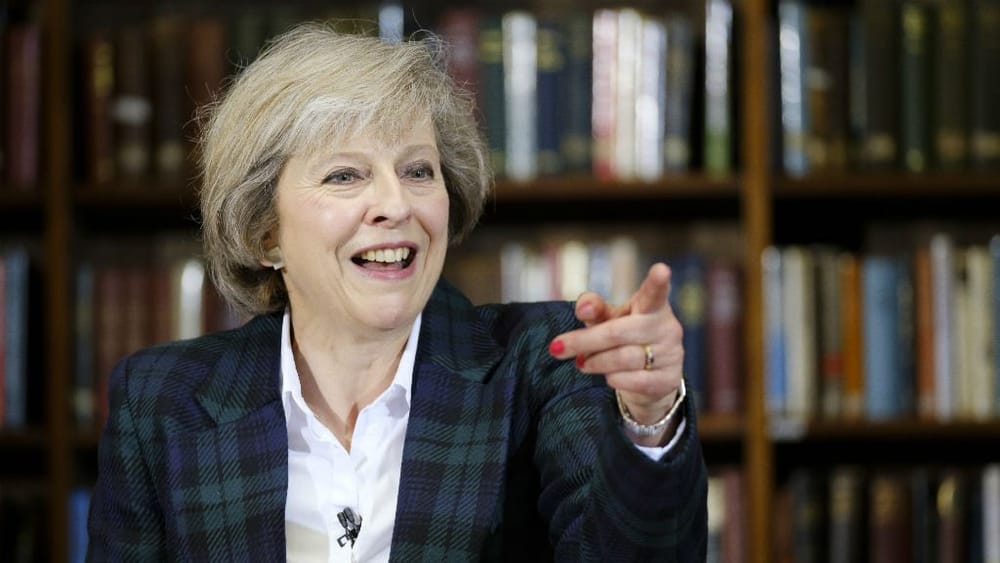 May Warns from Division amid Sterling Fall against U.S. Dollar