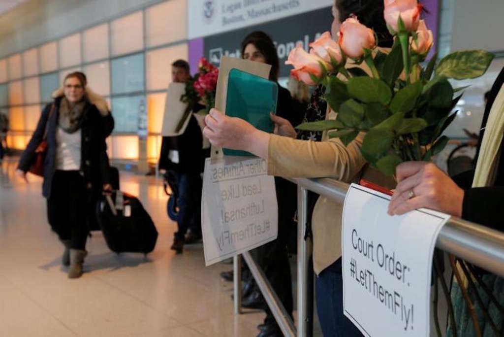 Federal Order Halts Trump’s Immigration Ban