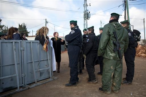 Israel Begins Evacuation of West Bank Outpost, Authorizes 3,000 Settler Homes