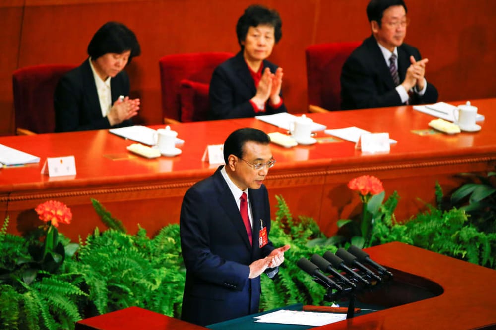 China Lowers Growth Target to 6.5%