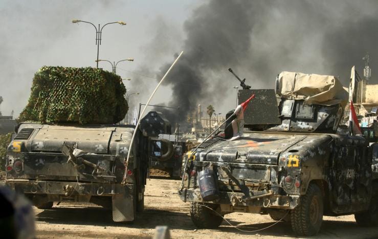 US-Backed Offenses Gain Ground against ISIS in Mosul, Raqqa