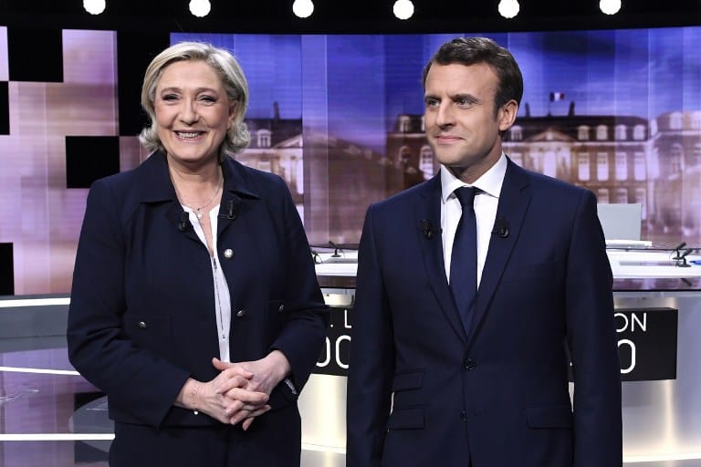 Macron, Le Pen Trade Charges in Angry Live Debate