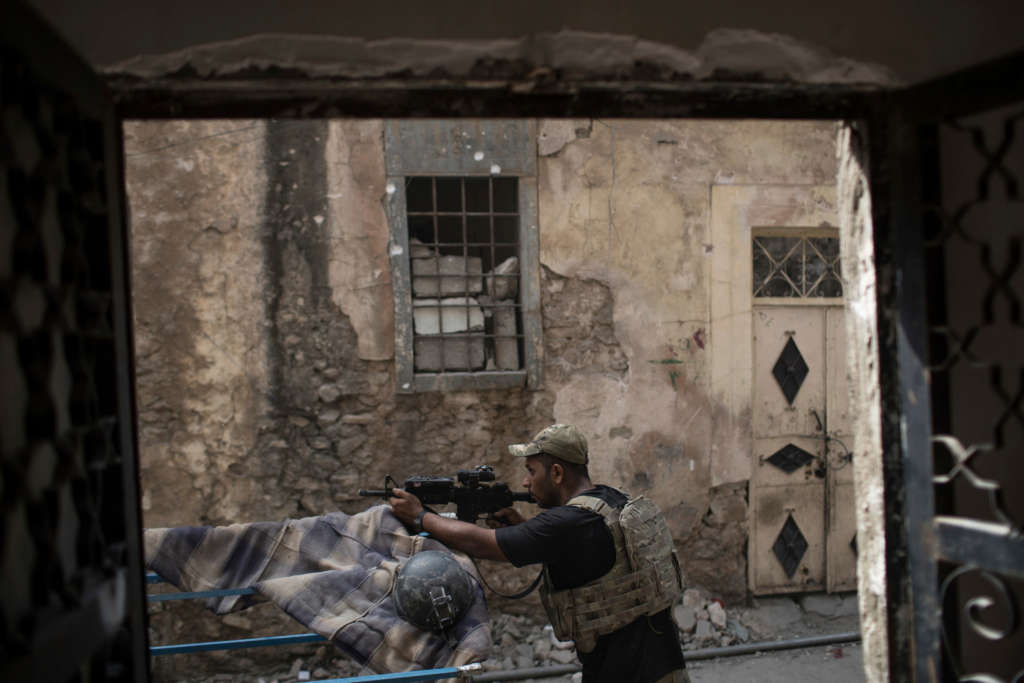 Iraqi Police Parade Car Bombs Seized from ISIS amid Pockets of Resistance