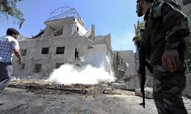 Suicide Attacks Hit Damascus Police Center