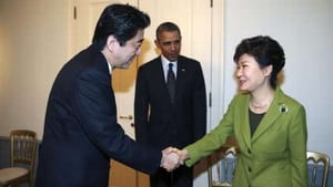 Obama brokers Japan, South Korea talks as Pyongyang fires missiles