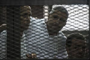 Egypt sentences three Al-Jazeera reporters to seven years