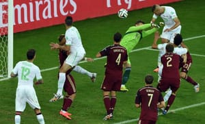Germany, US and Algeria advance, Suarez banned
