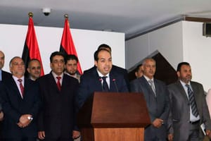 Islamist militia helps new Libyan PM take office