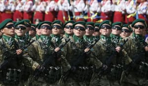 Defiant Ukraine turns on military display as war rumbles on in the east