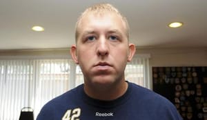 Ferguson police officer who killed black teen resigns from force