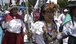 In overtime, UN climate talks head for watered-down deal in Lima