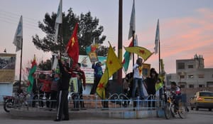 Kurdish fighters rout ISIS militants from town near Iraq