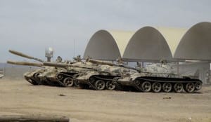 Saudis airdrop arms to Aden defenders, Houthis pull back