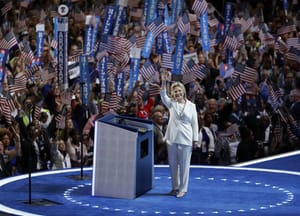 Clinton Promotes National Unity, Takes Aim at Trump