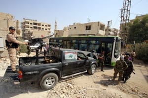 300 Syrians Leave Rebel Damascus Suburb under Daraya Deal