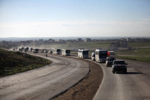 More Syrian Rebels, Families Evacuate Homs under Regime Deal