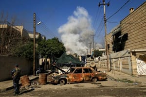 Iraqi Forces Capture Mosul Bridge, Close in on State Buildings