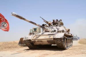Iraq’s PMF Tests Coalition, Putin Fears Division