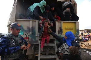 Mosul Residents Wait in Camps to Reunite with Families