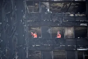 Over 50 Possibly Killed in London Tower Fire, PM May Admits Failings