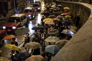 Thousands of Hong Kongers Take to Streets in Memory of Long-Time Dissident Liu Xiaobo