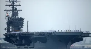 US Navy Ship Fires Warning Shots Near Iranian Vessels