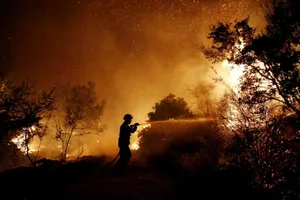 Athens Wildfire Spreads to Three Towns, Destroys Homes