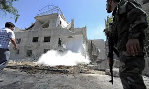 Suicide Attacks Hit Damascus Police Center